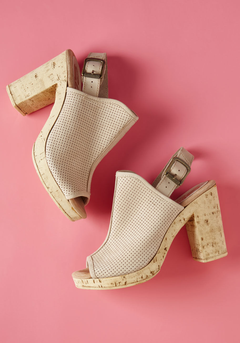 Almonte - When you need a break from it all, no cruiseship is necessary - just these beachy, beige platform heels! Grab a cold drink and hit the patio