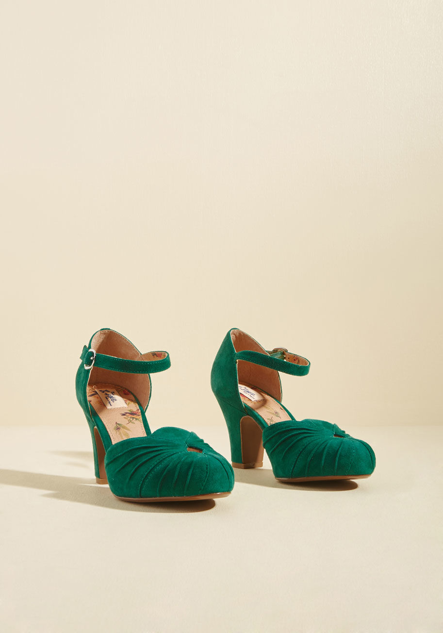 Amber - These emerald heels assert that finding the perfect retro pair means flaunting 'em on the reg! Inspired by Hollywood&rsquo;s golden era of glamour, these suede kicks from London-based brand Miss L Fire surpass previous footwear forays with their delicate 