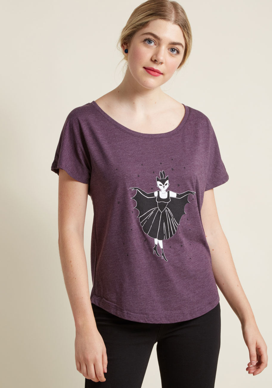 Bat Cat - Excite your pals with your spooky style through this purple graphic tee! Decorated with a twinkling of black stars and a white cat dressed