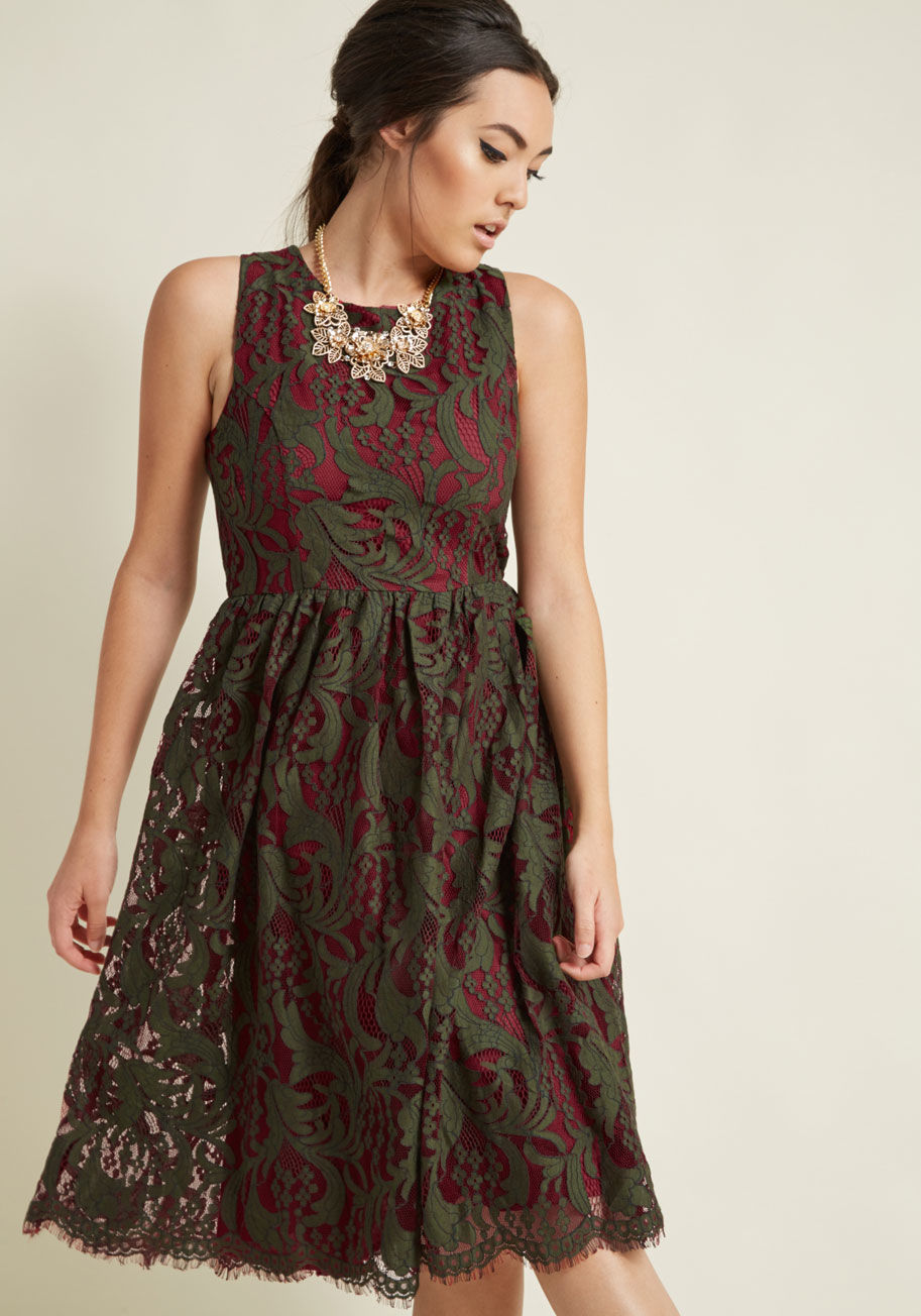 This lace dress is endlessly elegant without being overly bold. We're loving the layering of rich burgundy and olive tones, the perfectly tailored princess seams, and the eyelash-fringed hemline of this gathered-waist midi, and so will everyone who approa by BBAW170815A