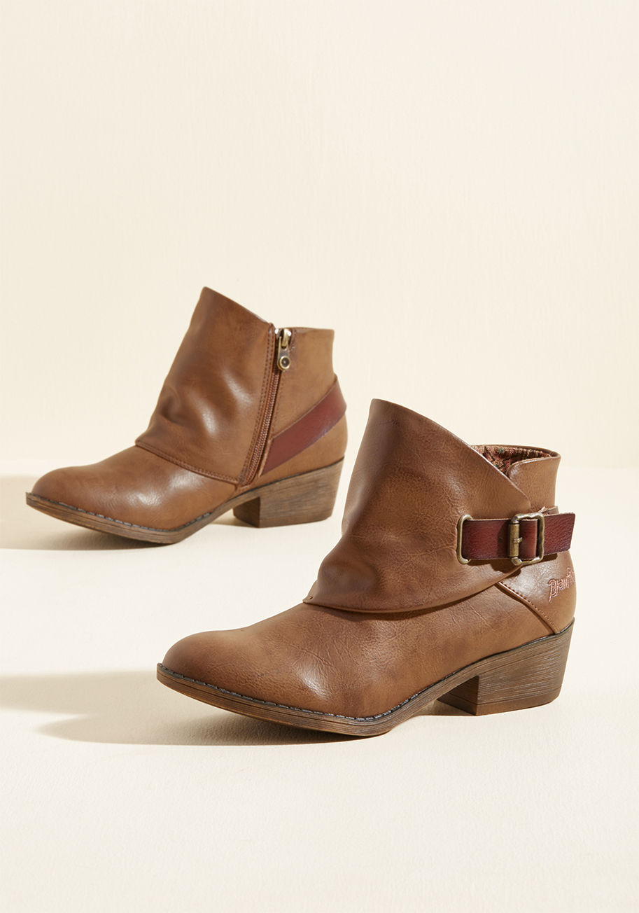 BF-6728 sill - Leave it to these brown booties from Blowfish to get you everywhere with serious aplomb! Supported by mid-height heels, detailed with buckled mahogany straps, and folded at each shaft, these faux-leather beauties are an on-the-go gal's dream pair.