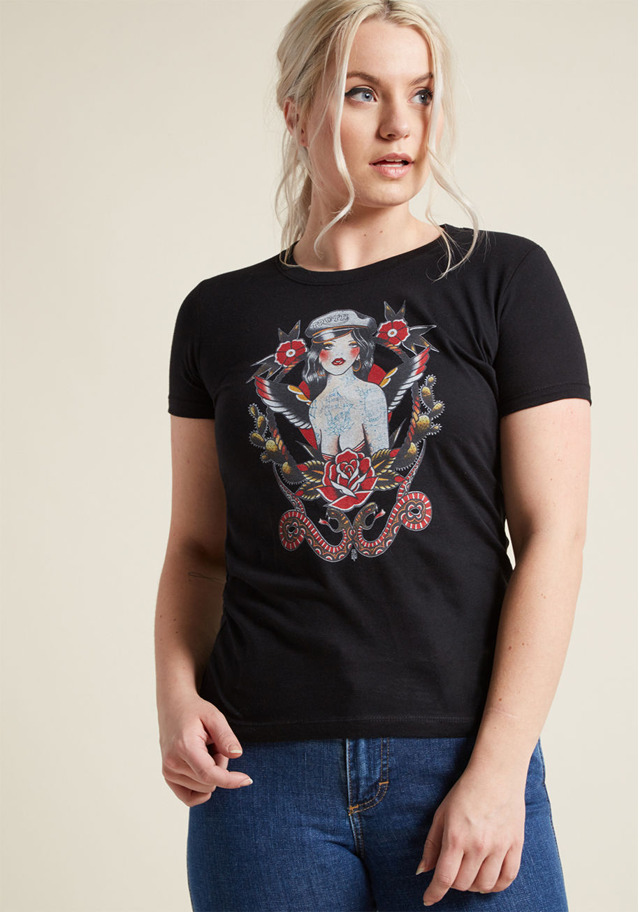 Emulating the pin up queen atop this black graphic tee, you step out with a balanced boldness that everyone notices. This cotton T-shirt unlocks all the sass you have inside, courtesy of its old-school tattoo motif - a style of which others will 'ink' hig by Biker Girl