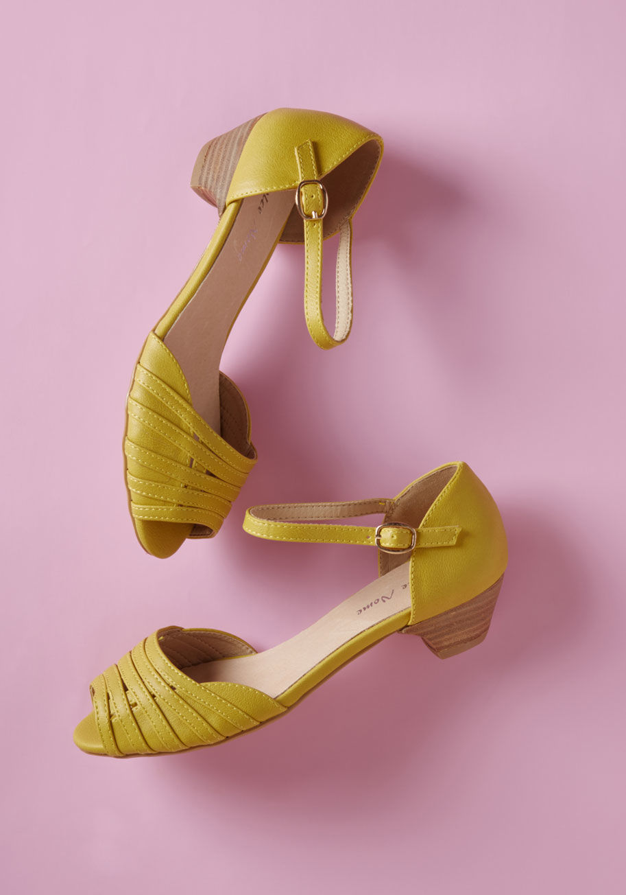 Cara - Give your favorite outfits a peppy refresh with these mustard peep toes! Elevated comfortably by tapered, mid-height heels, lined with leather beneath glossy, woven uppers, and secured by classic ankle straps, these retro kicks will keep you on your feet 