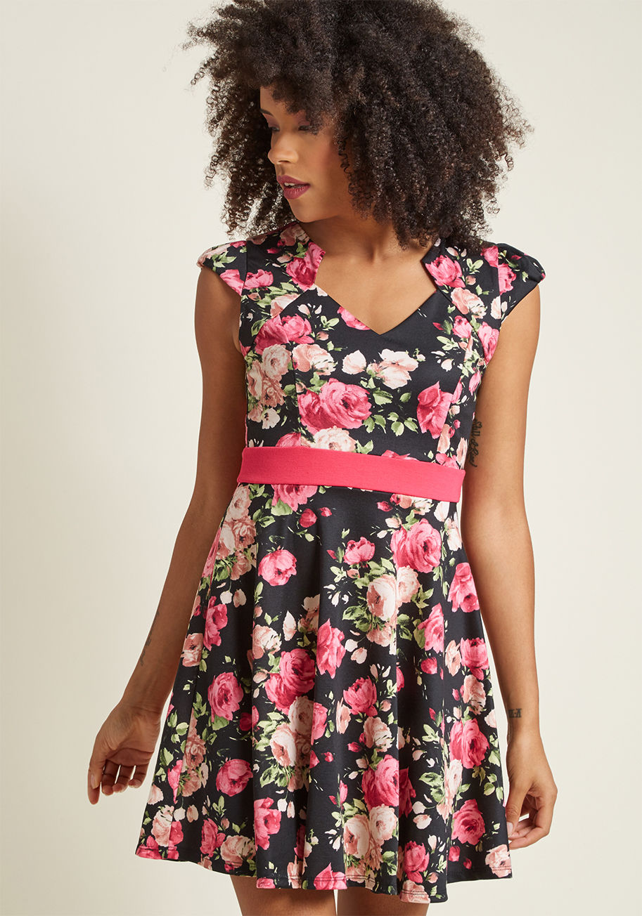It was as if the fates knew you'd been looking for that perfect floral frock to add some serious style to your day-to-day wardrobe. This beauty boasts a bold black base, warm hued blooms, and a banded waistline, all of which woo you each time you explore  by D5579