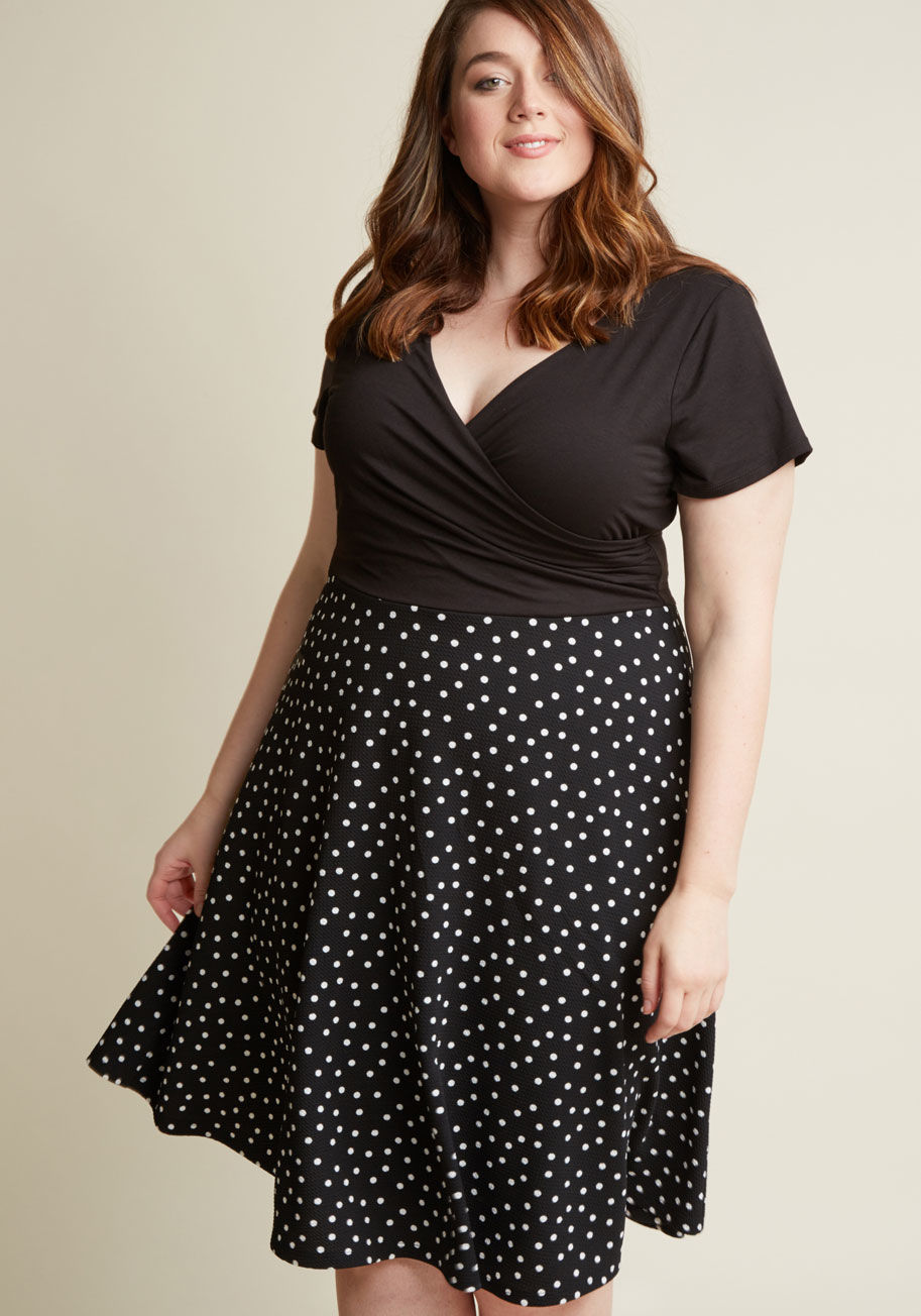 D7453F - Whether you decide on peach oatmeal or waffles at the garden&rsquo;s cafe, you already made a stylish choice with this jersey dress. Boasting a flirty wrap top and a textured skirt with playful white dots, this ModCloth-exclusive frock is as beautiful as 