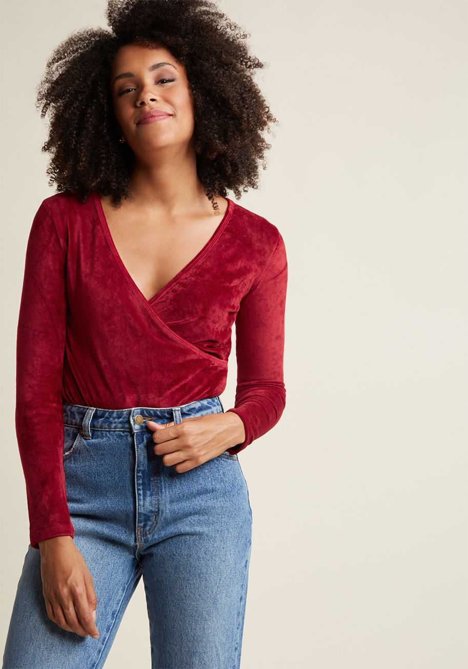 FA17HAN56 - Just when your fashion fans begin to wonder how you'll style this deep red bodysuit next, you arrive on the scene with a fresh new take! A fine pick from Compania Fantastica, this long-sleeved piece is one you'll flaunt with frequency, for its surplice ne