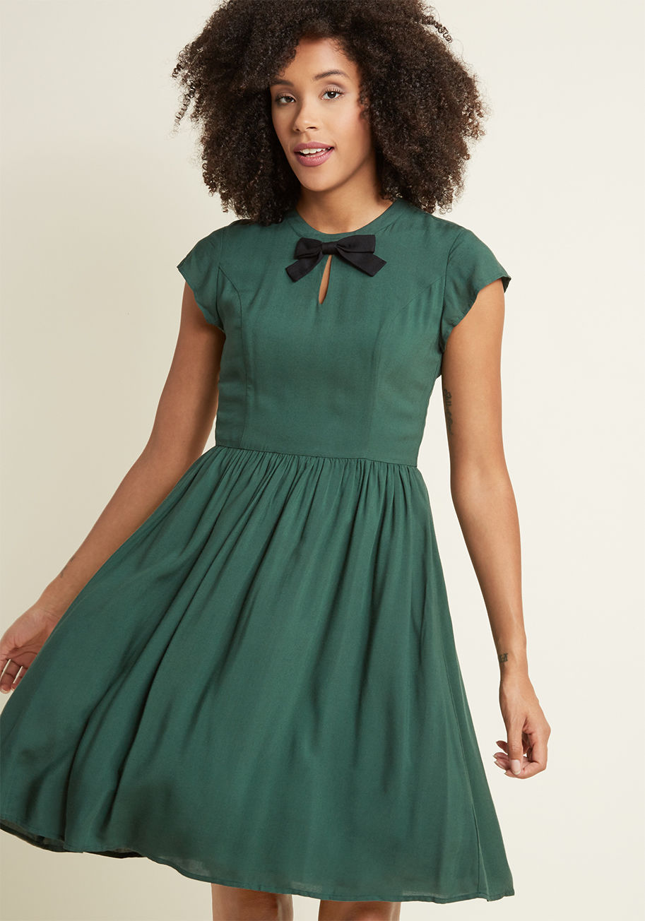 Retro frocks just don't get more darling than this dark green dress - a proud part of our ModCloth namesake label! Once you slip into this A-line's cap sleeves - positioned on either side of its black bow and adorable keyhole - its princess seams, and its by FA17MCD1394A