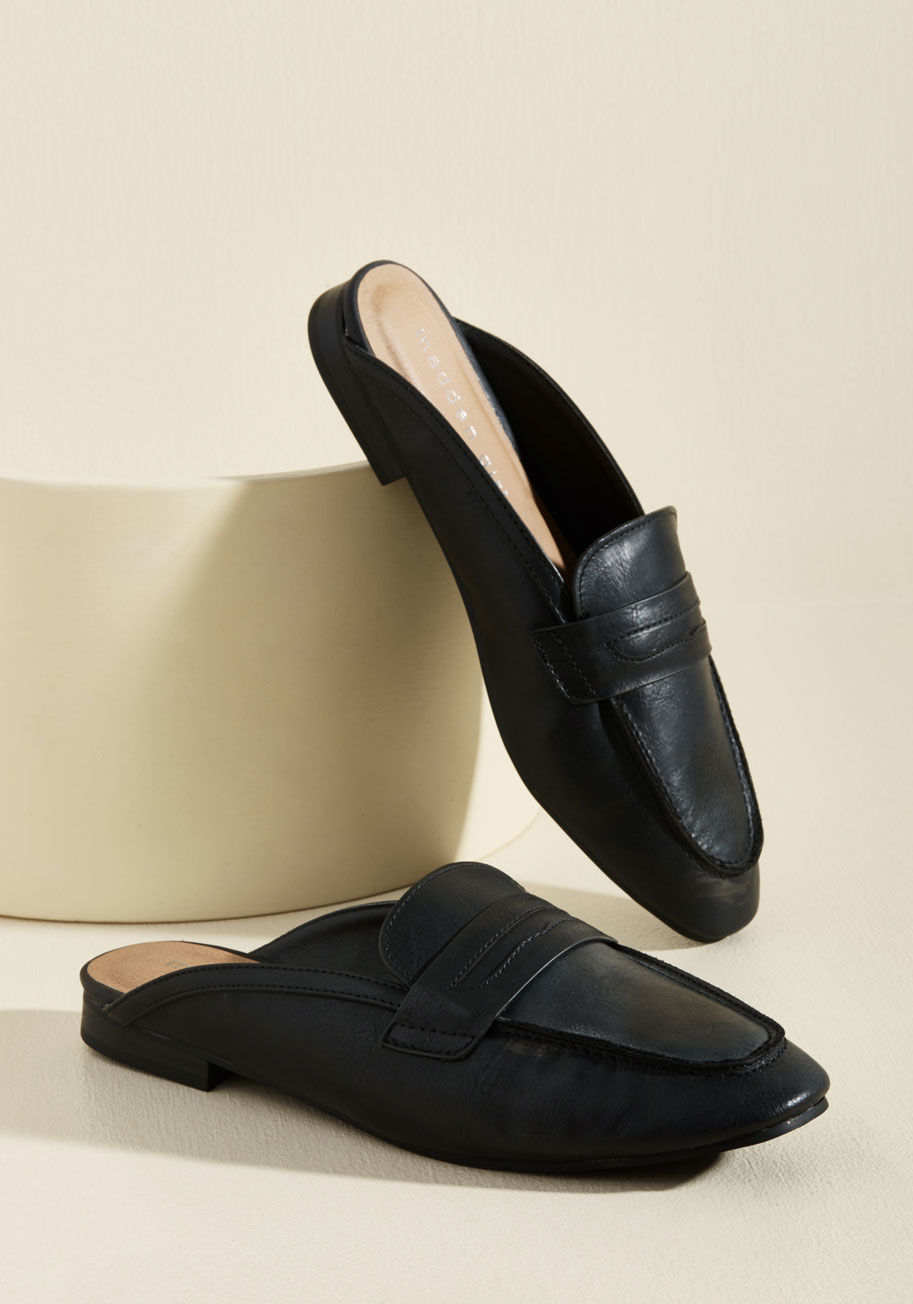 FRAN - From your desk to your dinner party, these black loafers from Madden Girl keep your toes looking tip-top! You simply won't stop smiling from the moment you don these slip-on mules - touting square toes and faux-leather uppers - which add delight to every 