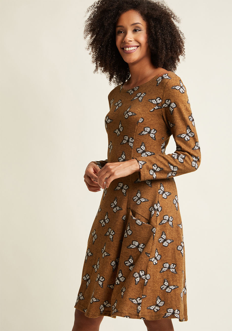 Not every garment is tailored to make you feel like your best - most winning - self, but this pocketed sweater dress sure is! Style its brown knit, black-and-white butterfly print, and princess seams, so that your sweetest side is undeniably detectable. Y by FS17207