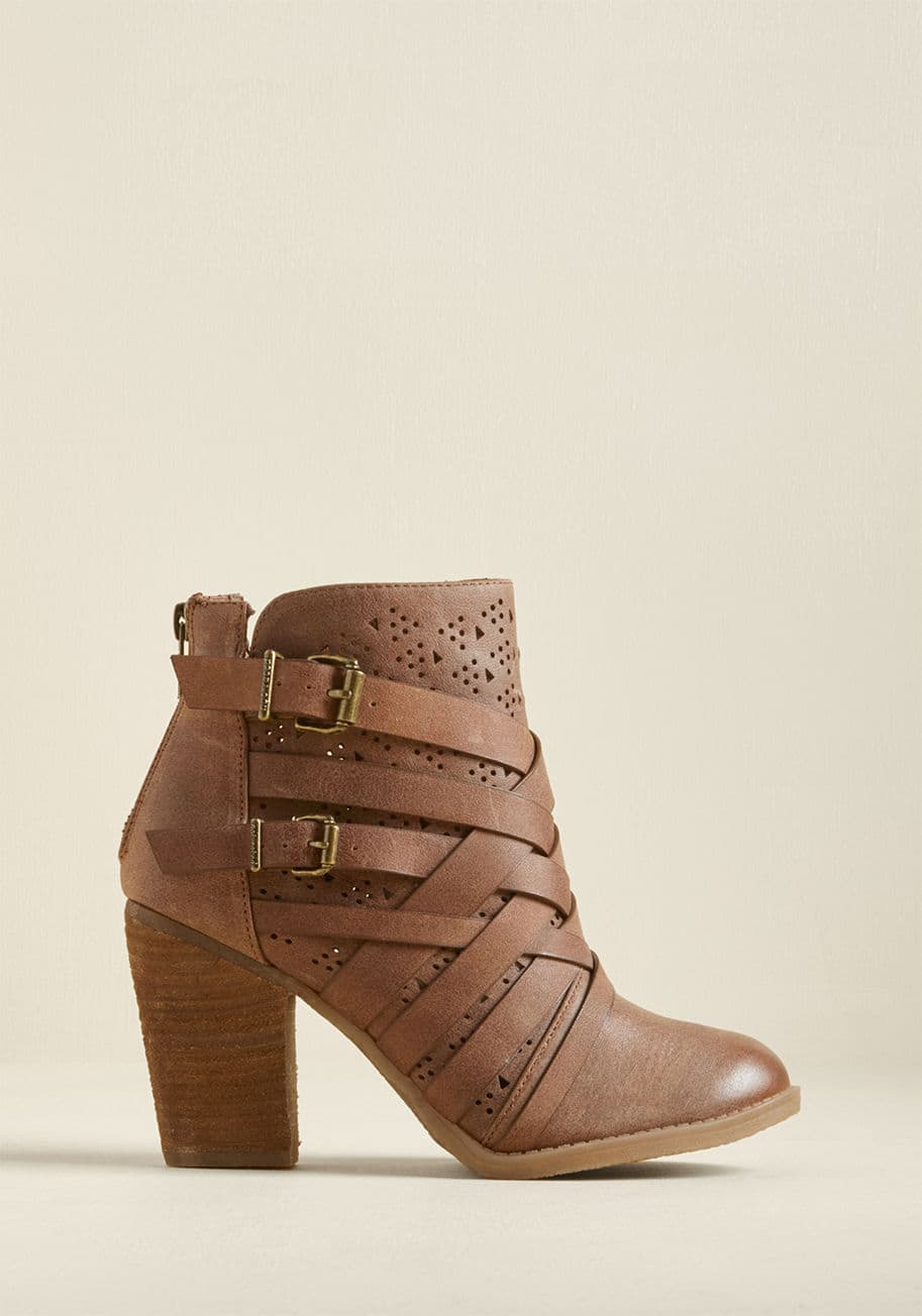 Gaudi - Hit up your all haunts ready to show off a new side of your style with these brown booties! Showcasing a whole collection of crisscrossing straps overlapping perforated front panels, pairs of decorative buckles, bronze back zippers, and stacked heels, the