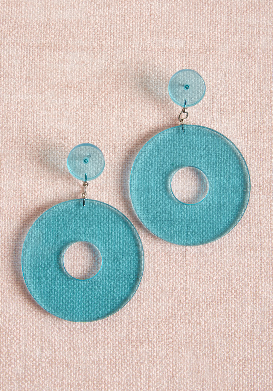 There's no second guessing your appreciation for '60s-inspired style when these round earrings adorn your lobes! Translucent, teal, and totally retro, this bold pair conveys your sentimental perspective with crystal clarity. by GE4015BL