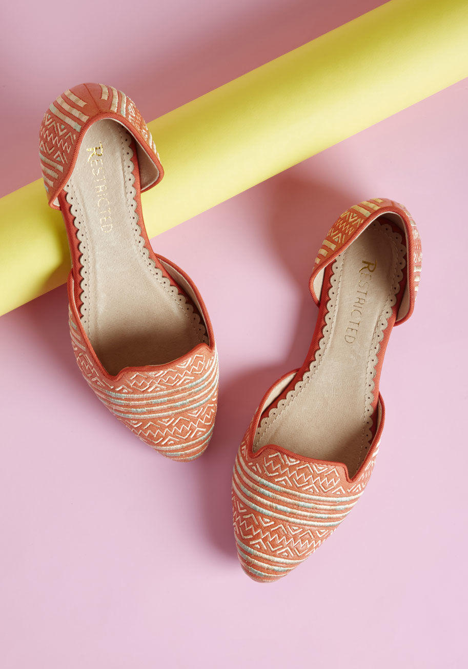 Giselle - If your earnest request is for fresh new flats, then these d'Orsay skimmers from Restricted are a dream come true! The loafer-like silhouette of these orange kicks is updated with geometric embroidery