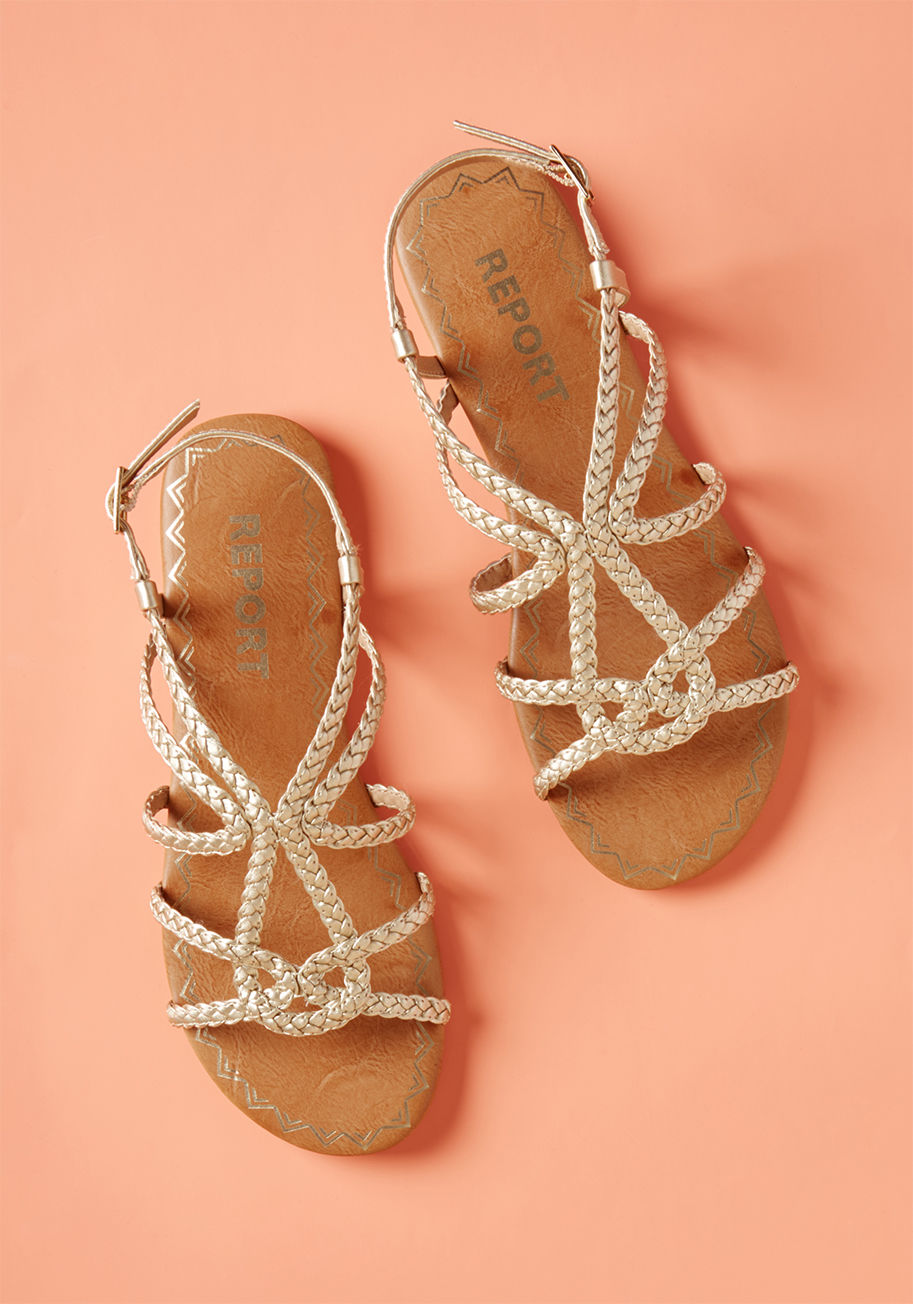 Always waiting to add oomph to your ensembles, these metallic gold sandals embody vogue versatility. A Report Footwear pair, these buckled slingbacks star winding, faux-leather straps that are brilliantly braided and blissfully infused with casual beauty! by Gracey