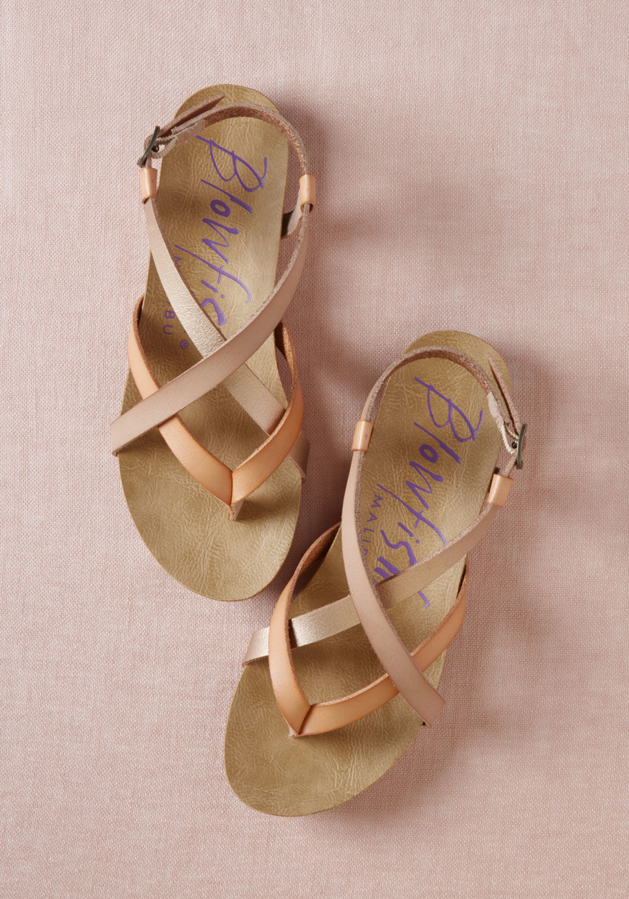 Granola - Even your mellow attitude can&rsquo;t hold back your glee over these pink sandals by Blowfish! Built from faux leather with a minimalist platform sole, these strappy flats crisscross frosty rose and blush hues around your feet with straightforward ease.