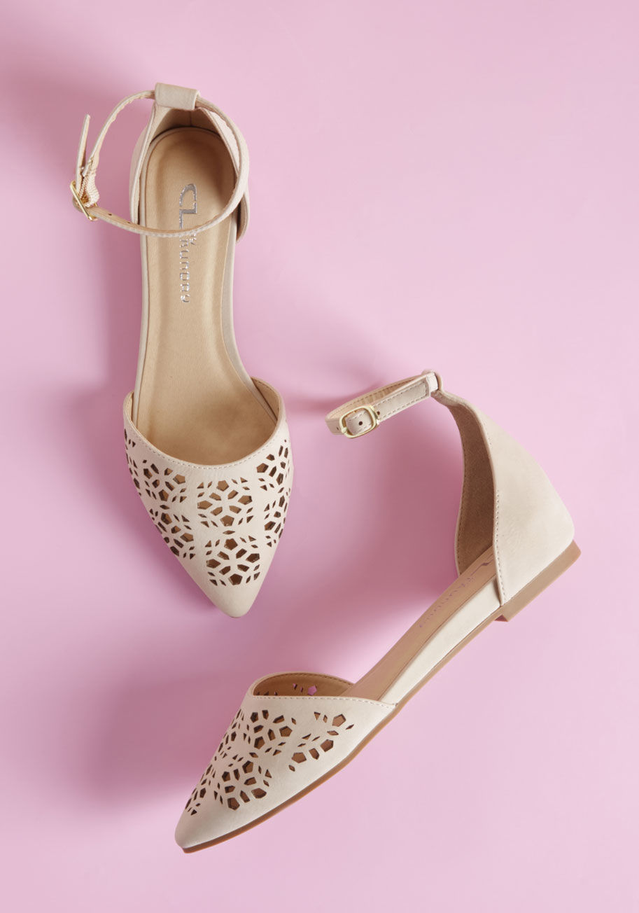 Hello - Whatever top-notch flats you choose to flaunt on your toes, your fashion following is sure to take note! This particular beige pair features faux leather with a nubuck finish, ankle straps, and geometric laser cuts atop each pointed toe. Are they the perf