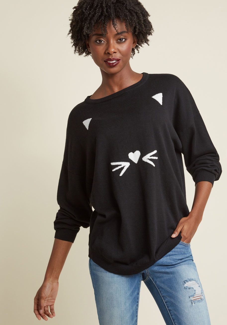 When it's late at night and the moon is bright, the black cat on your Sugarhill Boutique sweater might give you a fright! Just kidding, this roomy pullover is nothin' but cozy and its white intarsia ears, whiskers, and heart-shaped nose are friendly as ca by K0031-B