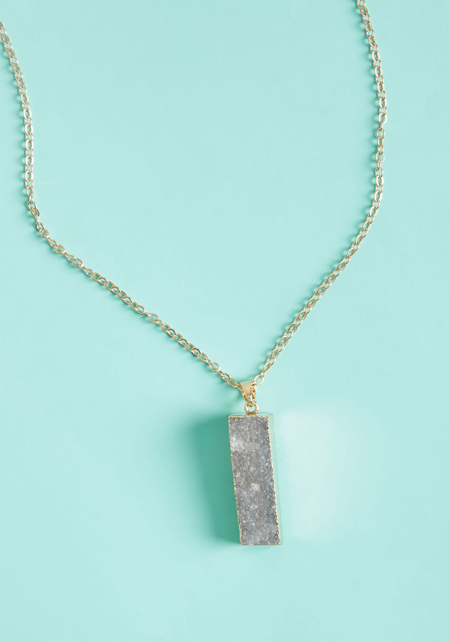 Not every boho-inspired accessory brings you the bliss that this golden pendant necklace does! Featuring a smoky faux-druzy charm cut into a rectangular shape, this sparkly piece sweetly portrays free-spirited style. by KN7822WT