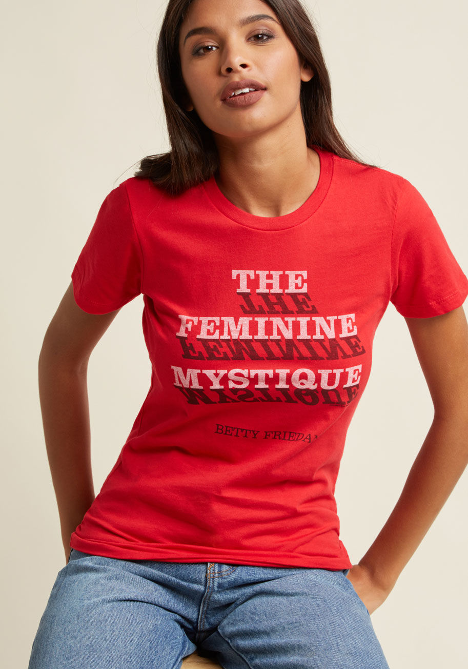 L-1067 - What was intended to be an academic article became an iconic bestseller - and is now celebrated atop this red T-shirt! From Out of Print, this cotton tee is emblazoned with the first edition cover of the pivotal piece of '60s feminist literature, and prom