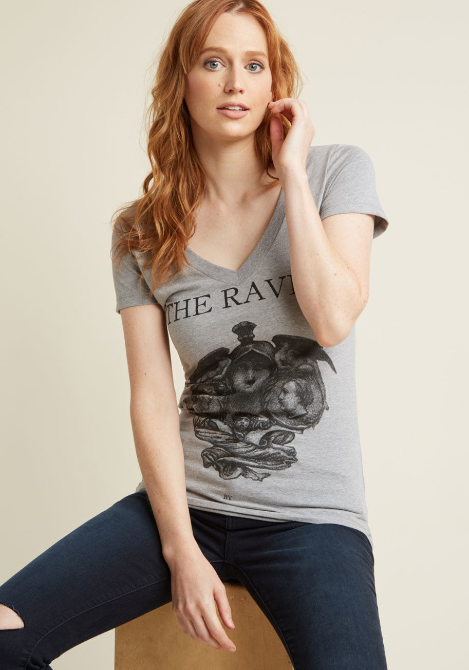 L-1178 - Bring your love of literature to your wardrobe with this grey tee by Out of Print! Crafted from a cotton blend, this V-neck tee features a snug fit and a jet black representation of Edgar Allan Poe's 'The Raven'. Righteous!