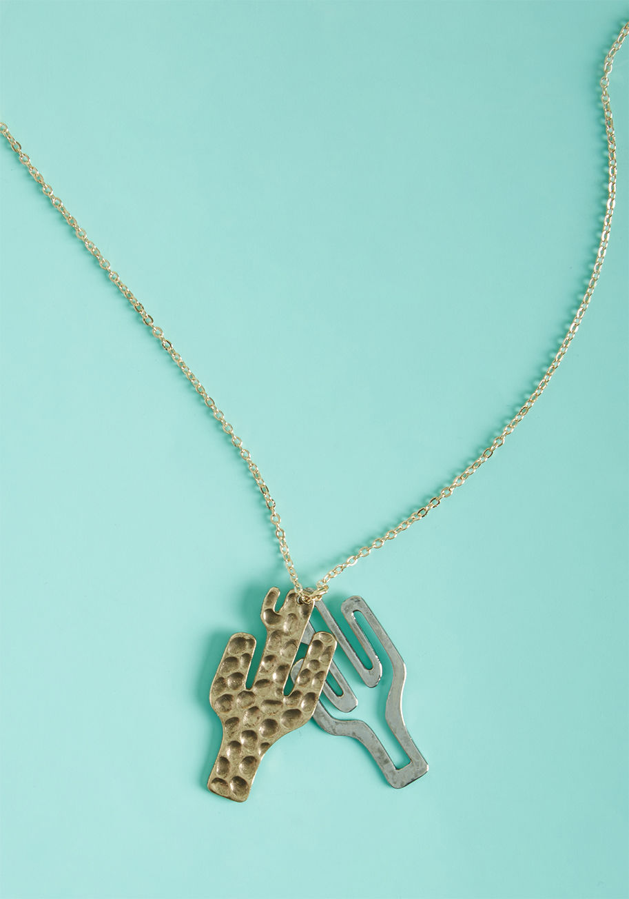 LN0670 - With this quirky pendant necklace, the delights of the desert can go wherever you do! A saguaro-shaped charm layered