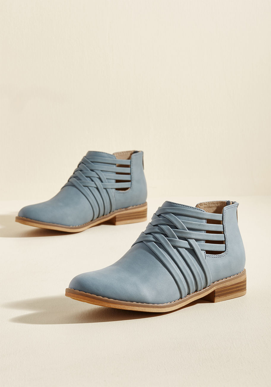 Mass - Desiring to indulge your love of unique detailing? We recommend zipping right into these blue booties! From Rocket Dog, this faux-leather pair takes a classic, sleek silhouette and remixes it with a quad of intersecting straps, highlighting its side cutou