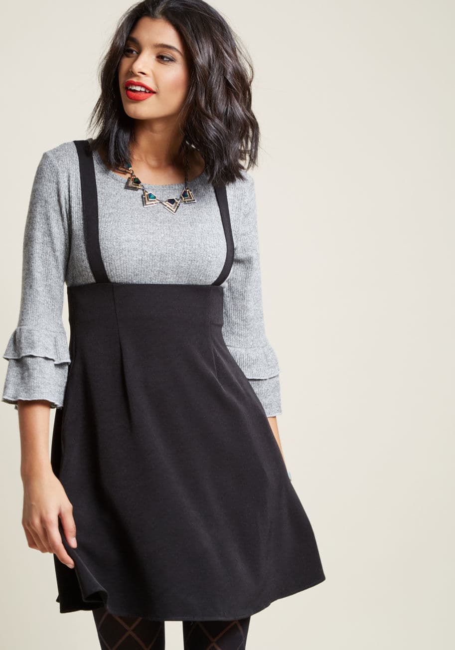 MCB1044 - Pioneer a series of groundbreaking looks with this black jumper from our ModCloth namesake label, and a wave of accolades will await you! Award-winning ensembles begin with the high-waisted silhouette and pockets of this supportive skirt, and end with a r