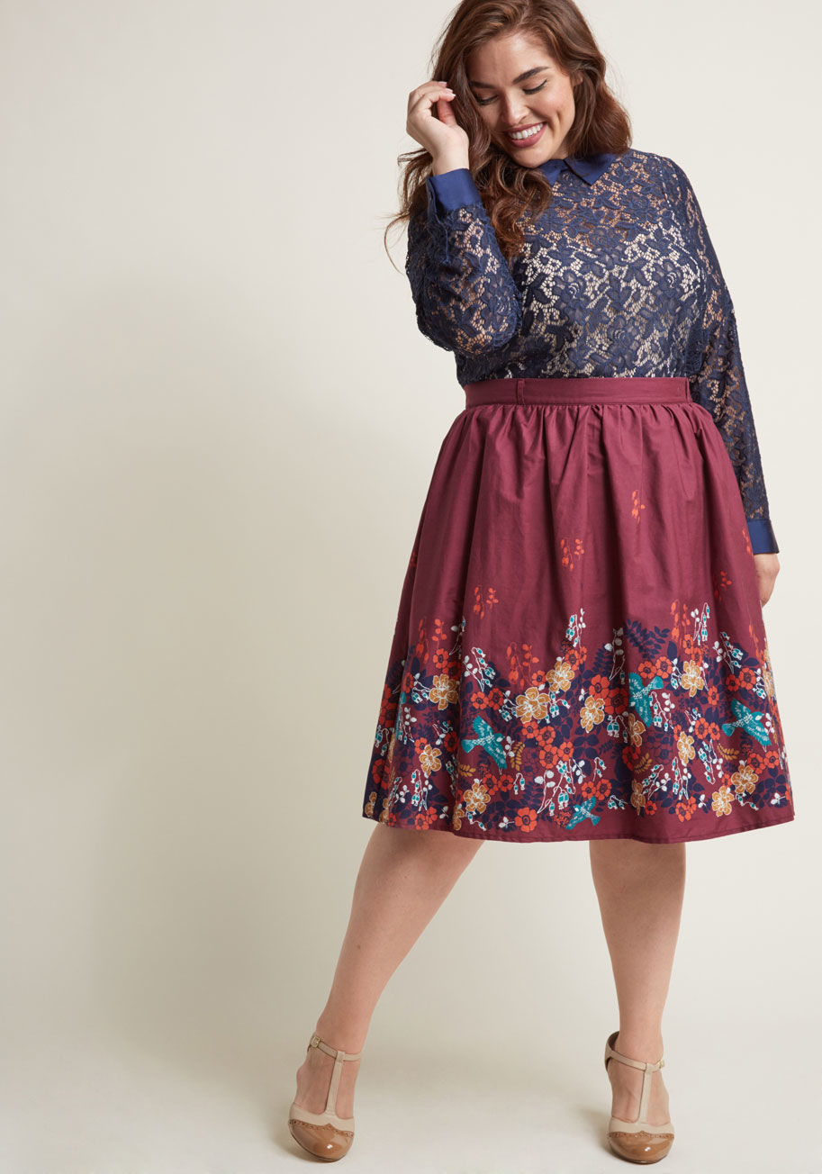MCB1303A - Whoever believes staple pieces should only be solid needs to met the sweet versatility of this burgundy midi skirt! A cotton offering from our ModCloth namesake label, this A-line makes it a pleasure to pair its belt loops, hidden pockets, and floral bord