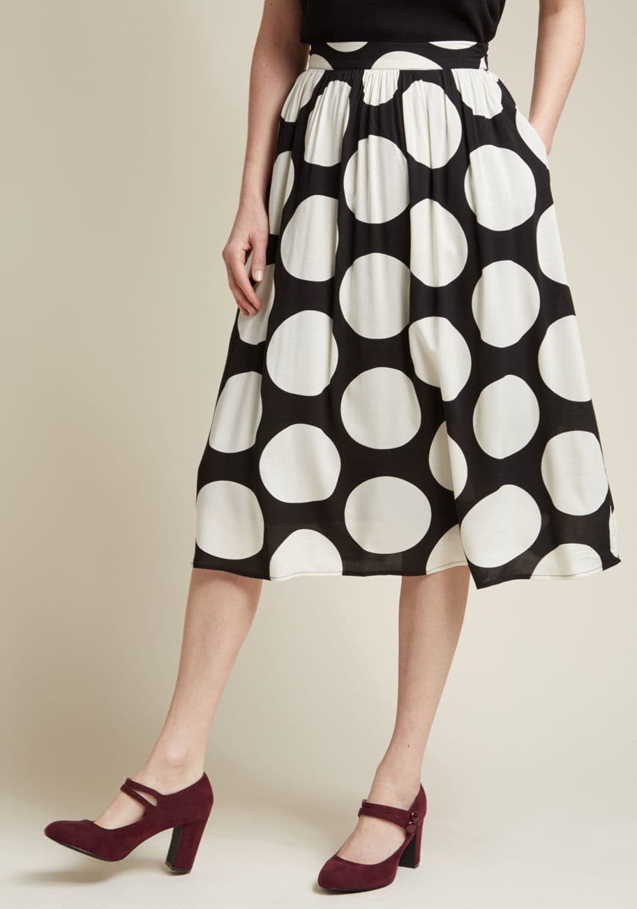 MCB1335 - Your blouses, sweaters, and tees sure could use a new pal - how about this black midi skirt? A charming companion from our ModCloth namesake label, this rayon challis number is an excellent match for your pre-existing pieces with its high waist, big white