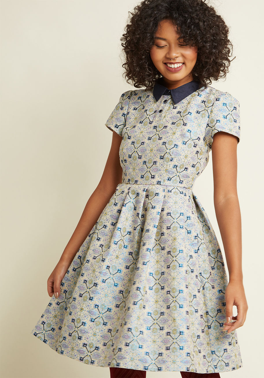 MCD1194C - You know us best for our elegant looks and surprising finds - now, get to know this cream shirt dress from our ModCloth namesake label! Celebrating a divine style perspective with its navy collar, smooth buttons, hidden pockets, and tile motif