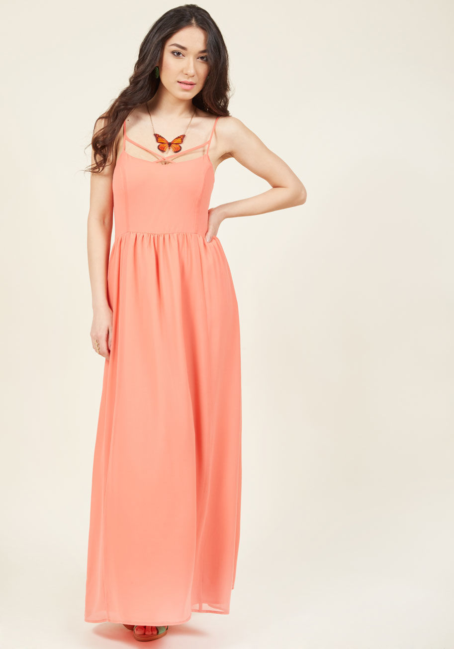 MCD1243 - Your task? Take this salmon maxi dress - a piece from our ModCloth namesake label - from daytime activities to nighttime fun. By implementing your style savvy on the strappy bodice and breezy, pocketed skirt of this truly eye-catching frock, you&rsquo;ll 