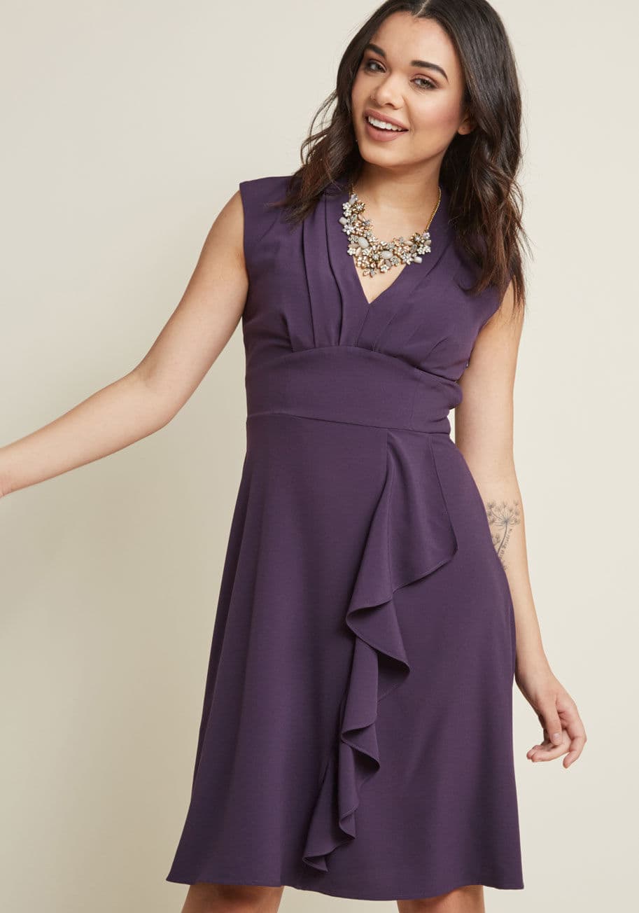 There are any number of ways to accessorize this purple dress from our ModCloth namesake label, but our favorite pairing is this frock's pleated V-neck and ruffled skirt with your radiant personality! Upon this chiffon beauty's admission to your wardrobe, by MCD1453