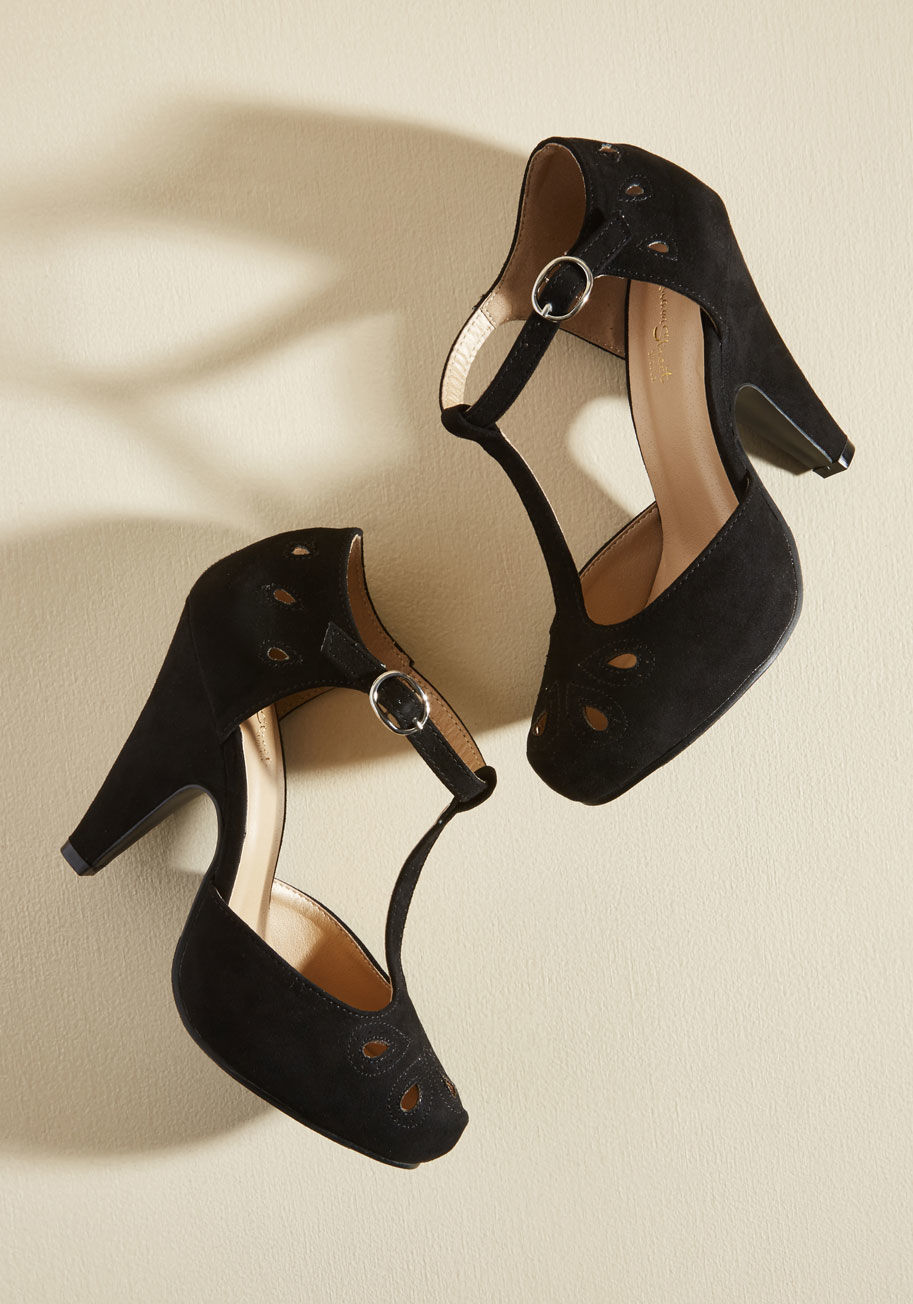 MCDD 1-5W - Team these playful black T-straps up with your dynamic dance moves and watch as magic unfolds! The tapered heels, teardrop-shaped cutouts with perforated accents, and faux-suede finish of this ModCloth-exclusive pair all put an oomph into your outfit that