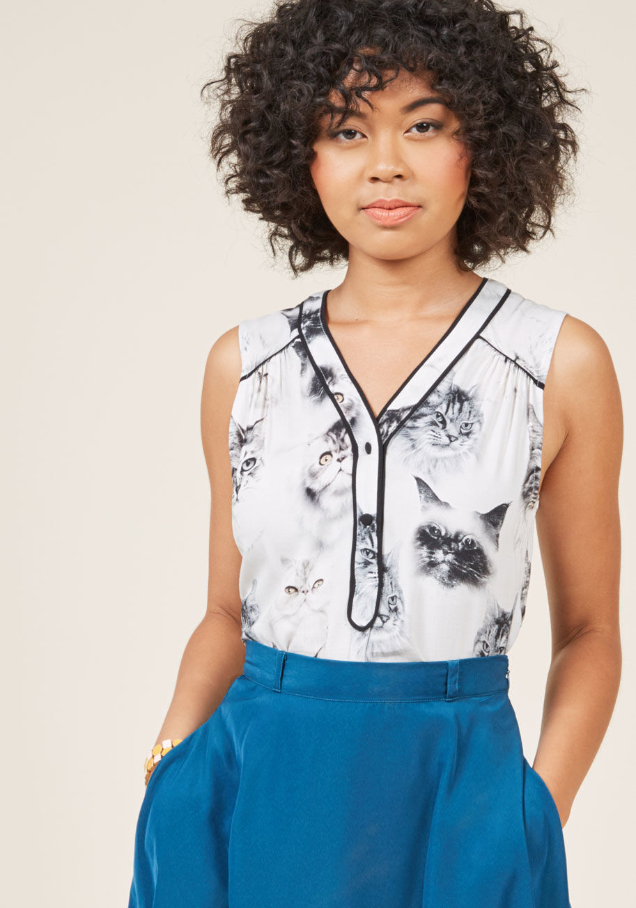 MCT1002I - Warmed by both the sun and your fresh brew, you remove your blazer to reveal what you most love about your outfit - this black and white top! Part of our ModCloth namesake label, this gracefully flowing blouse catches the breeze - and the eyes of passersb
