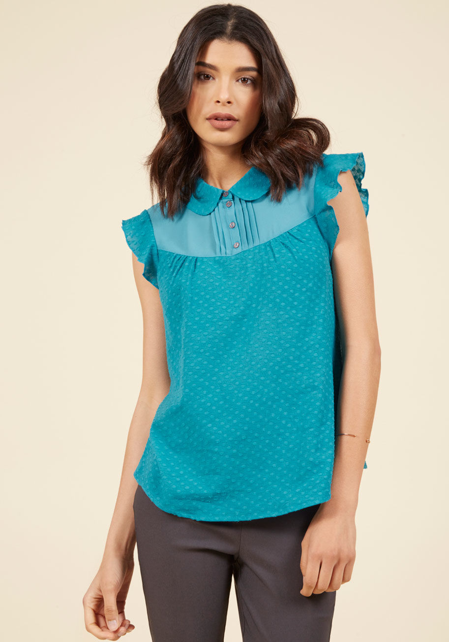 MCT1159 - You'll become accustomed to expressing gratitude each time this sea blue top is styled into one of your ensembles! A cutely collared, primly buttoned piece from our ModCloth namesake label, this ruffled separate touts a crepey cotton fabric with a dotted 