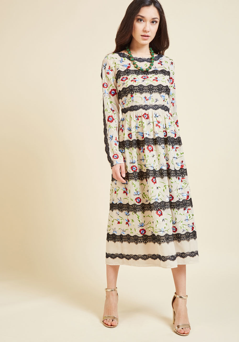 There's a rumor circulating that this taupe midi dress is host to a world of ethereal glamour, and we're pleased to confirm the hearsay checks out! This ModCloth-exclusive frock inspires timeless tales with its sophisticated long sleeves, black lace strip by MDD1096