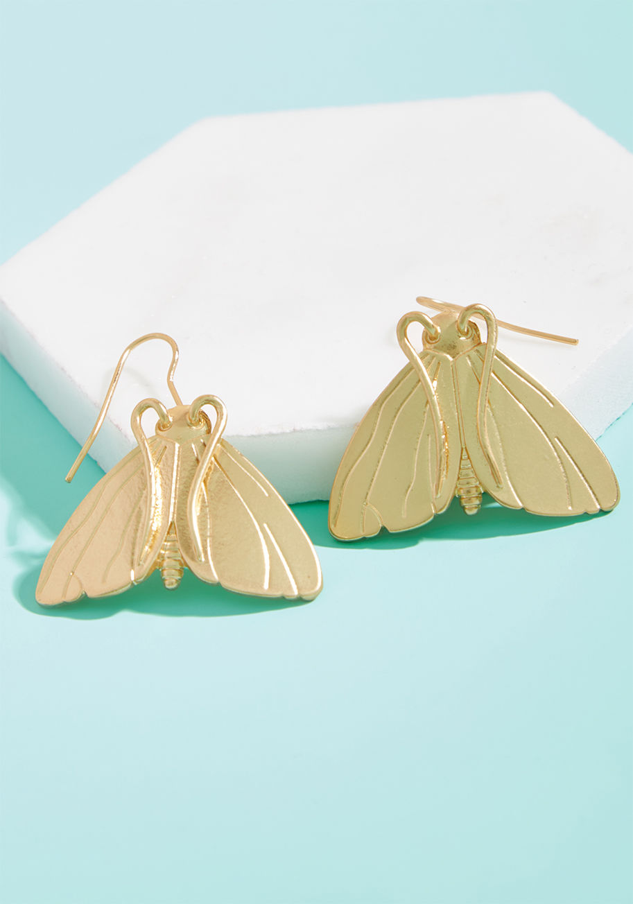 Oh yes, you read that correctly - these gold earrings are proudly named after this beloved institution. The moth-shaped silhouettes of this quirky pair are exclusive to ModCloth, so such a title would only be fitting! There are no other darling danglers t by MTM05-1103