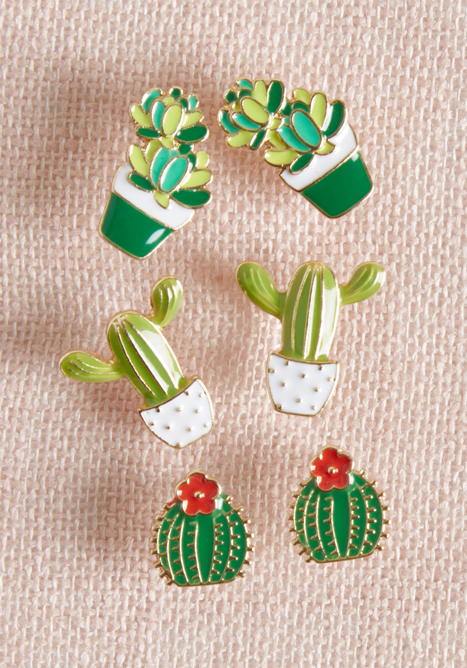 MTM10-3096 - Some houseplants are content on their sunny ledge, but the trio of succulents depicted on this ModCloth-exclusive set of studs are destined to see the world! Featuring a flowering Mammillaria, potted jade, and saguaro
