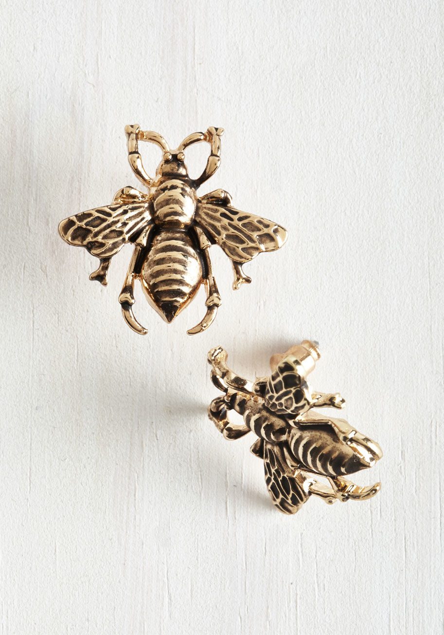 You never know when a beautiful insect will buzz by, so keep your camera and these gold, ModCloth-exclusive earrings handy! Intricately engraved, these antiqued accessories offer a vintage-inspired touch to any and every sweet day. by MTM18864