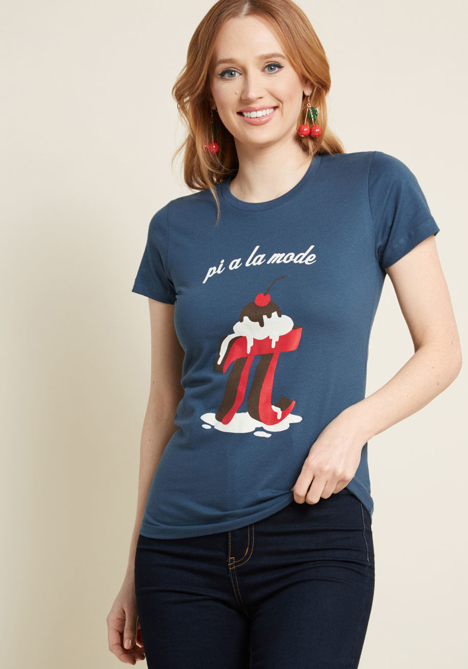 It may be irrational, but this cotton T-shirt has you dreaming of randomly distributing dessert throughout your diet! With a sequence of details such as a snug fit, a dusk blue hue, and a red, white, and chocolate brown graphic depicting a punny, ice-crea by Pi A la Mode