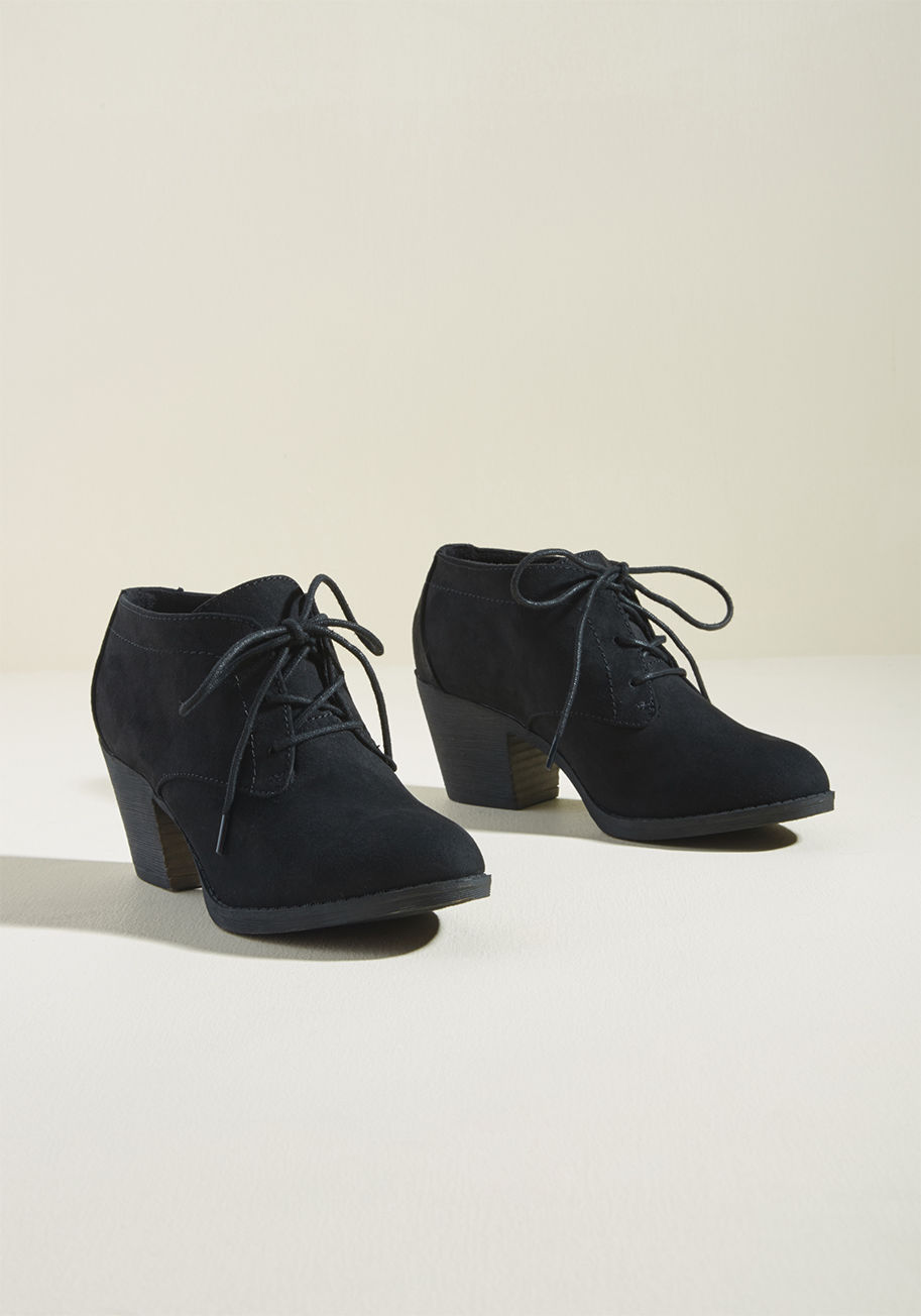 Sam - You won't have to raise your voice to direct all eyes to these olive green ankle boots - they command attention all on their own! Featuring block heels, lace-up closures, and a faux-suede finish, these versatile Rocket Dogs are all-occasion amazing.