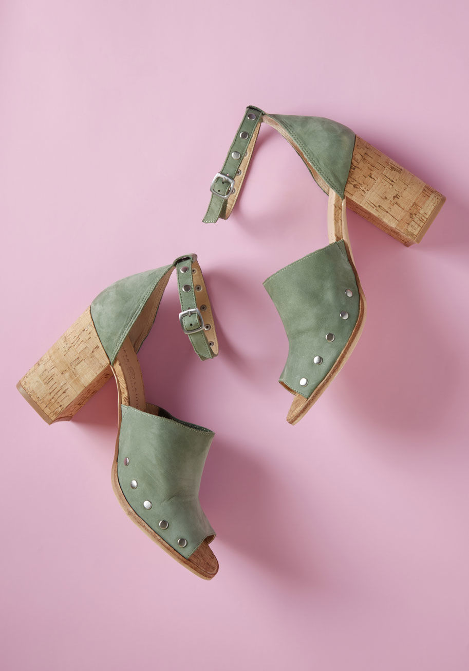 Savana - Welcoming these soft suede heels into your shoe collection will make all your favorite ensembles feel new again! Their sage green hue will inspire new color pairings, the silver studs along their ankle straps and toe panels offer a distinct edge, and thei