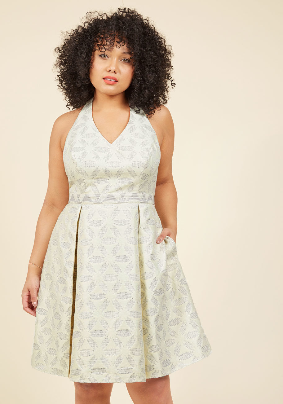 SP217MCD1276 - Each wear of this jacquard cocktail dress is a style awakening all over again! Part of our ModCloth namesake label, this tied halter dress is woven into a cream-and-blue tiled floral pattern with contrast fabric at its waistband and peeking out between it