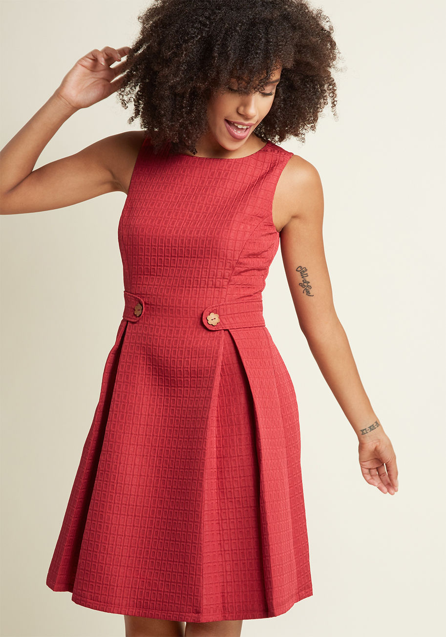 SP217MCD1280 - You can channel any number of fashion icons with this brick red dress from our ModCloth namesake label! The anything-but-ordinary square texture of this A-line spans the princess-seamed bodice, accent-pleated skirt, and waist-cinching side panels of this 