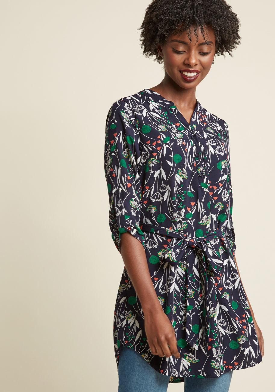 T311-07 - This navy blue tunic is always on double-duty, acting as a piece that's equal parts fun and functional! Perfect for daytime with its tab sleeves and buttoned V-neck, this ModCloth-exclusive top also flaunts a flirty matching sash and lovely white, green, 