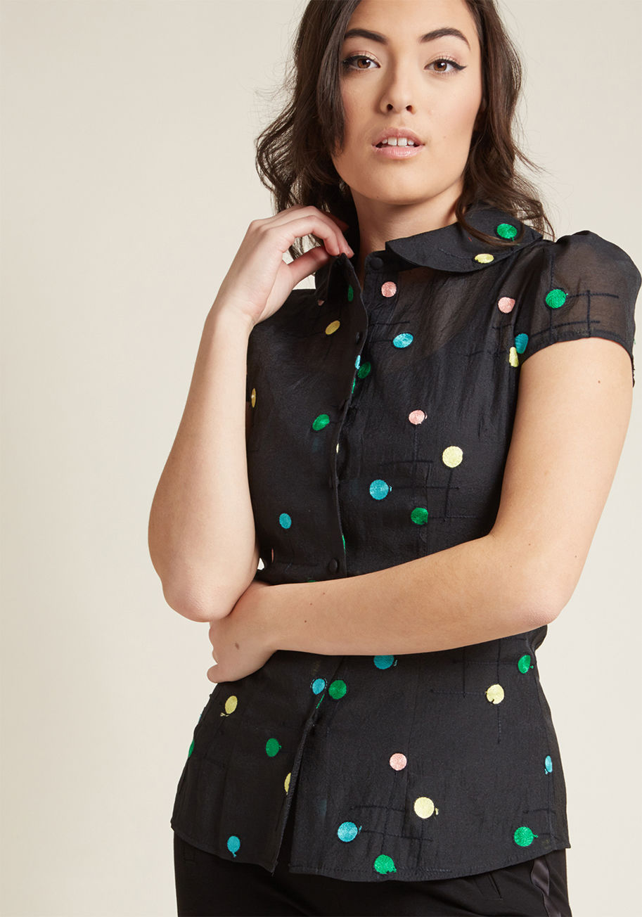 Oh, the incredible difference a few colorful dots can make! On its own, this black shirt is simply darling with its rounded collar, short sleeves, and sheer crepe-y material. However, the addition of yellow, green, pink, and blue embroidered spots transfo by TPA1830