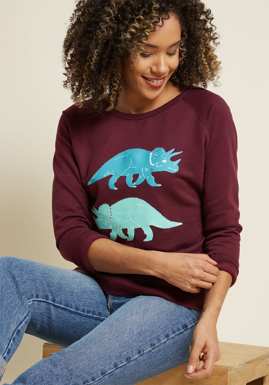 If at first your styling of this plum sweatshirt is a smash hit, sport it again and again! It shouldn't come as a surprise when the teal and mint Triceratops duo printed on this cotton-blend ModCloth exclusive receive legendary reviews from friends and fr by Triceratops