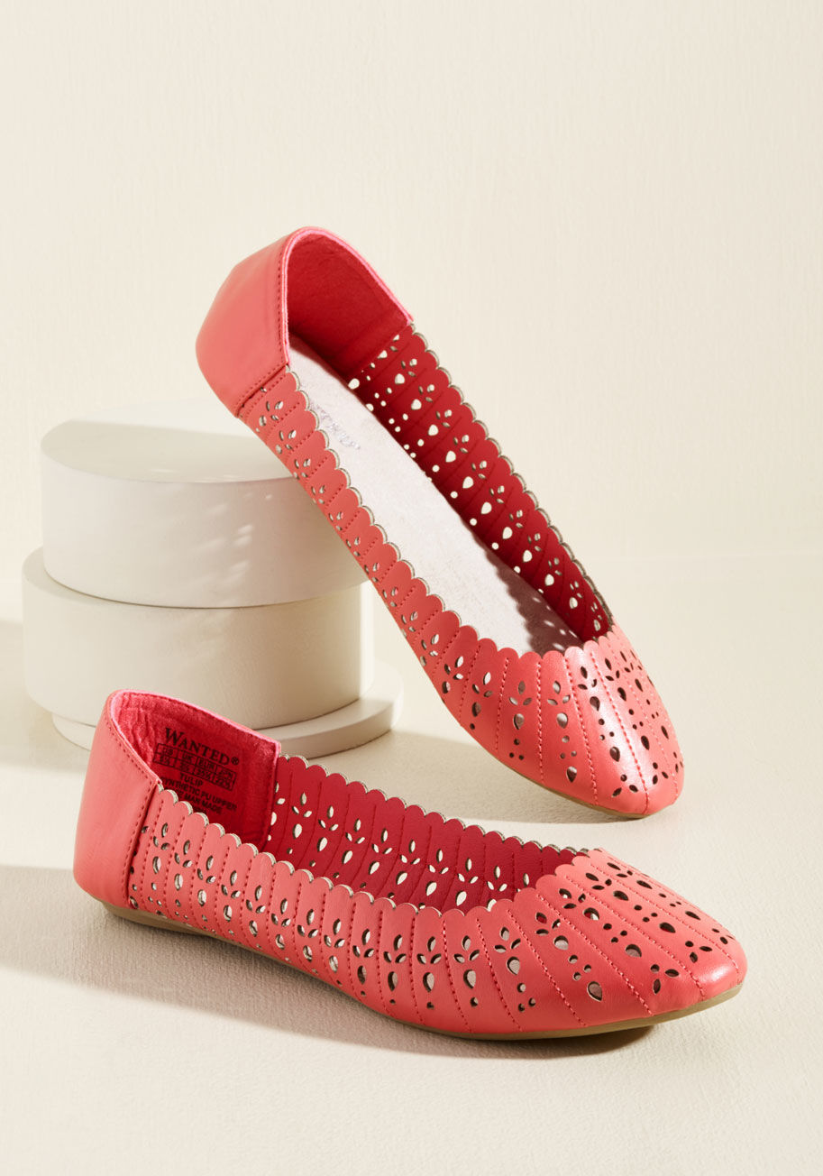 Tulip - Attendees at the garden tour are sure to pause and compliment these darling coral flats! Showcasing scalloped trim and a tasteful arrangement of petal-like cutouts, this faux-leather pair is as lovely as a lily.