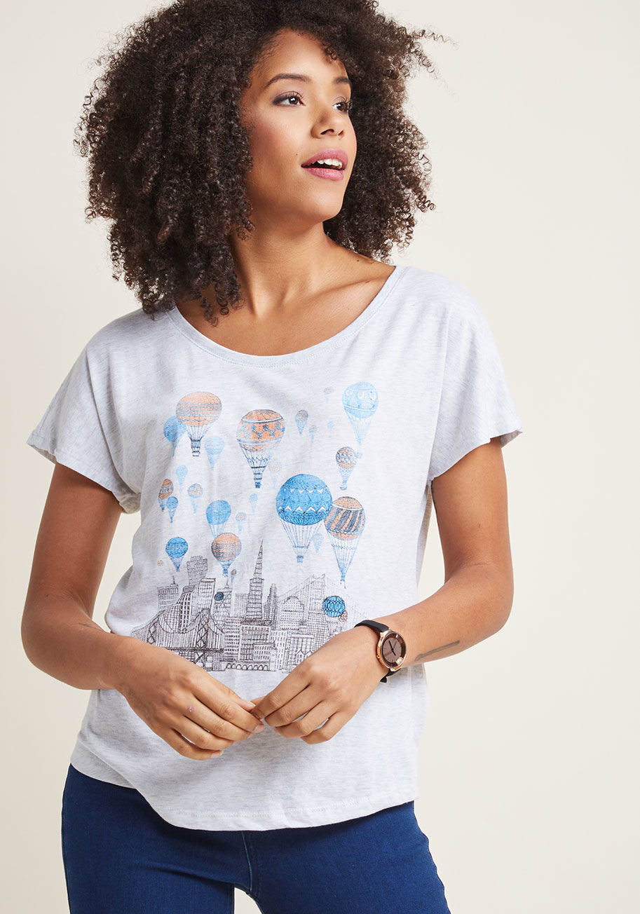 After class, measure your notes against your friend's, then do the same with your daydreams! This heather grey T-shirt - a ModCloth exclusive - makes it easy to let your ideas soar. With its blue, orange, and black depiction of hot air balloons filling th by Voyages Over San Francisc