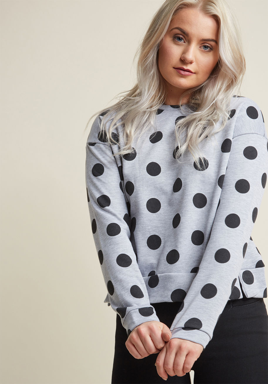 What's comfy, fun, and always there for you when you need a boxy sweatshirt? This heather grey top form Compania Fantastica! Featuring drop sleeves, vented sides, and a black dotted design, this terry sweatshirt will quickly become your new fave go-to. by WI17HAN72