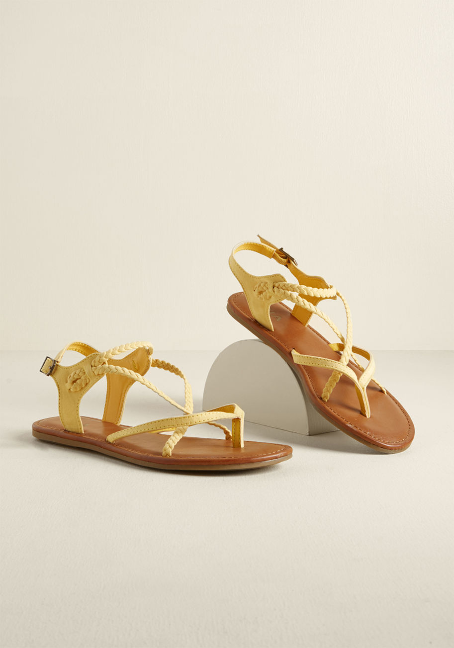 Let these yellow sandals carry your feet as the sights and sounds carry your wandering mind over fields and streams. Featuring a faux-suede construction, thonged toes, and a blend of straps and braids, these sweet slingbacks are just as dreamy as the dest by Winnie